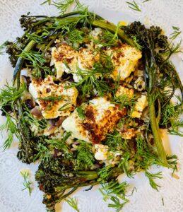 Baked feta with ras el hanout and broccoli by Vanessa May